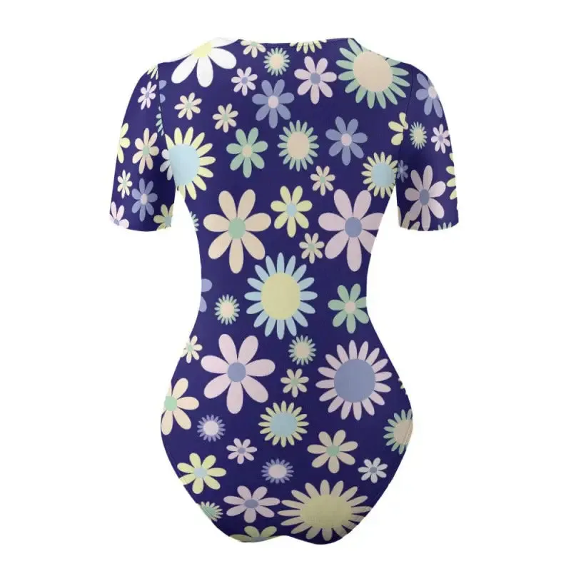 Bloom Where You’re Planted in This Blue Floral Short Sleeve Bodysuit